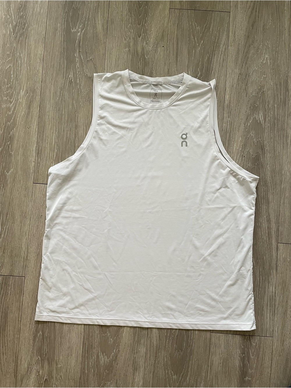 On Running White Menโs Athletic Sleeveless Training Tank